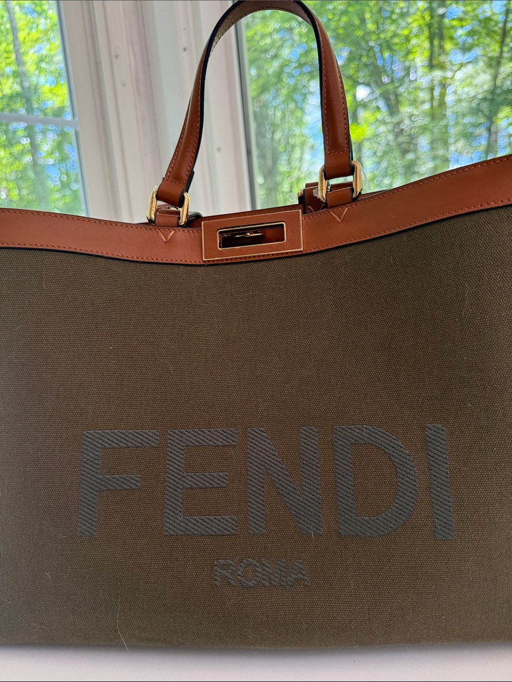Fendi Tote Olive canvas with Camel  color leather trim and handles. Like New.